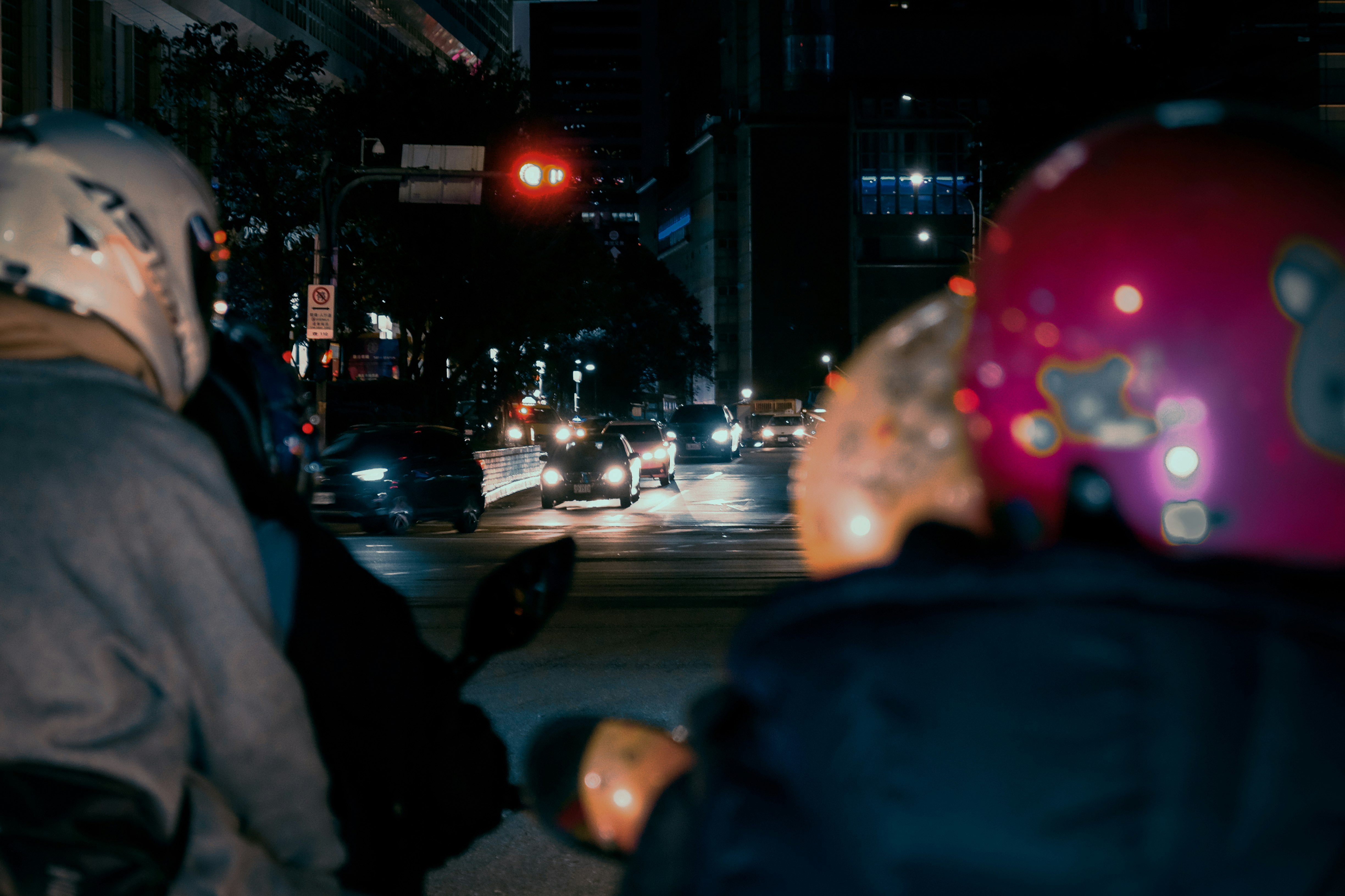 people walking on street during night time